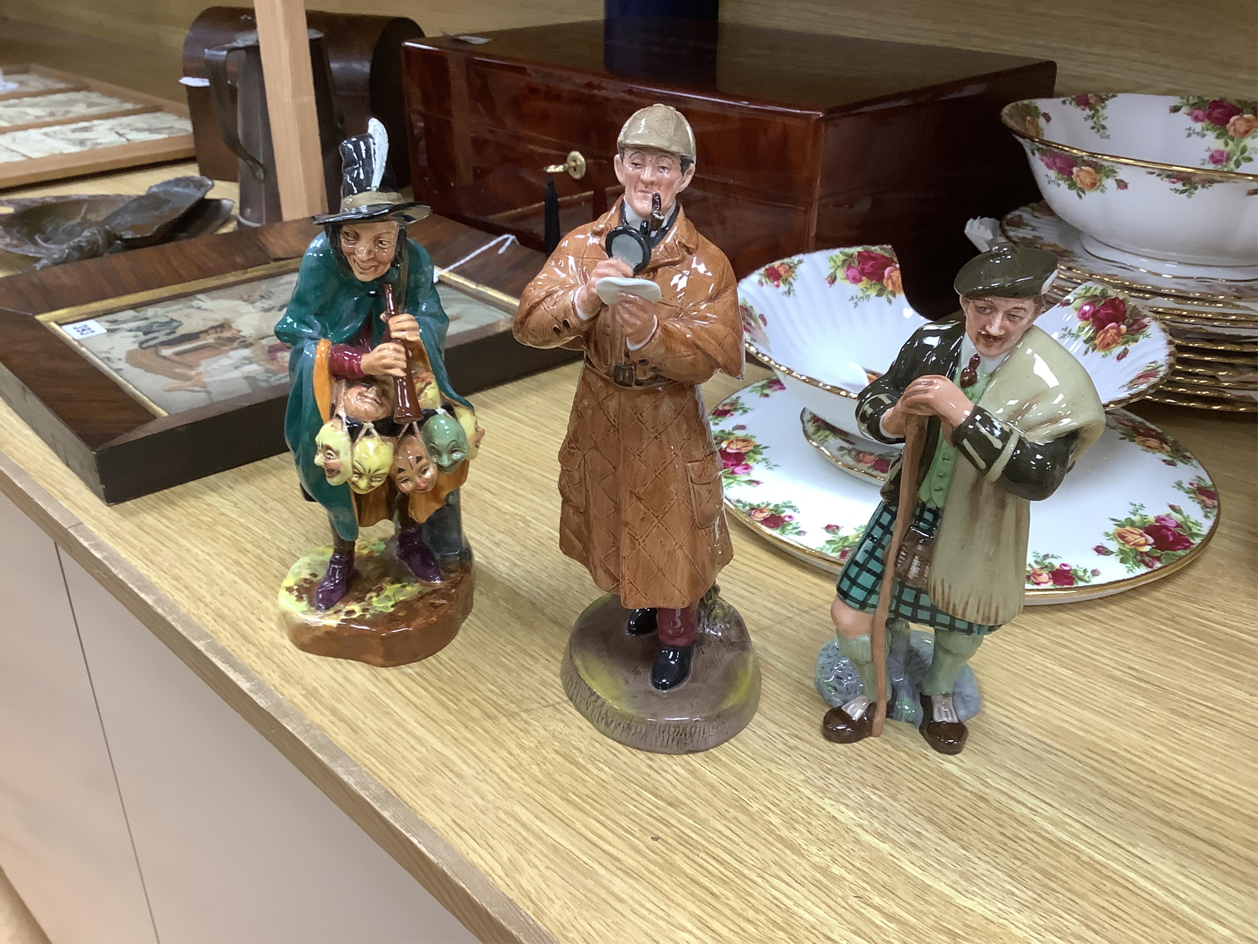 A collection of Royal Doulton figures to include The Old Balloon Seller, Doctor, Votes for Women and The Detective